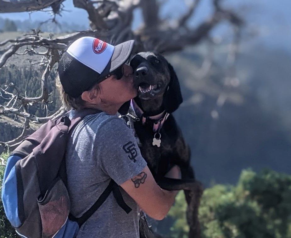 (TOP) Laurel Darren and her Plot Hound Daisy Mae enjoy one of their vacation adventures with Colorado's Lake City Hiking Club