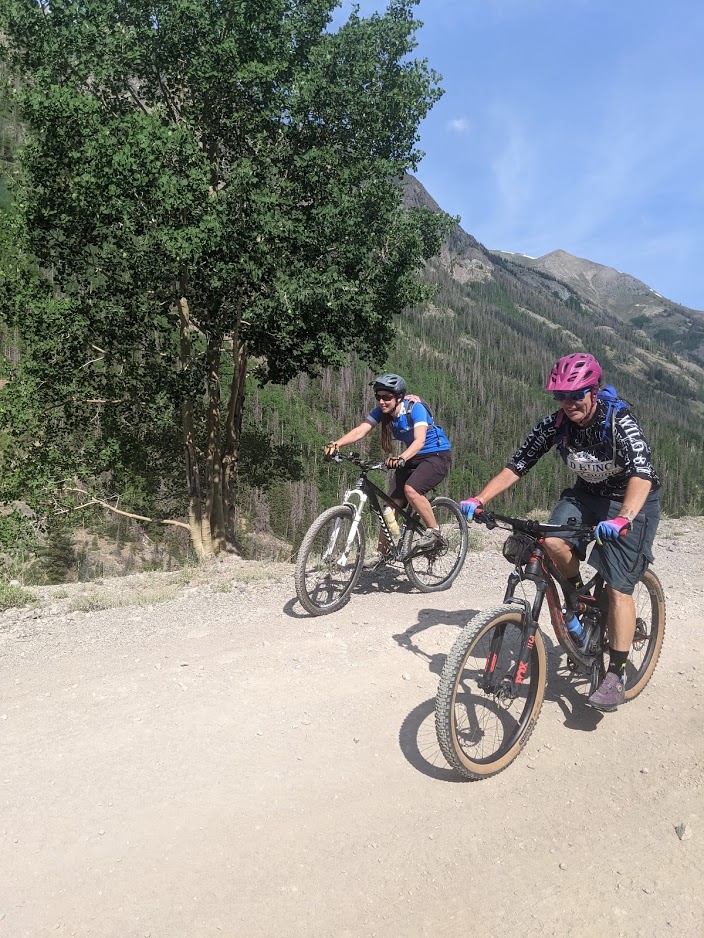 Laurel Darren (right) enjoys the trails of Colorado's San Juan Mountain on a mountain bike ride with Lake City local Lydia McNeese. The two are training with another Lake City resident, Amanda Hartman, for a race there next month during Darren's summer vacation away from day-to-day operations for Arizona's Wild Bunch Desert Guides.