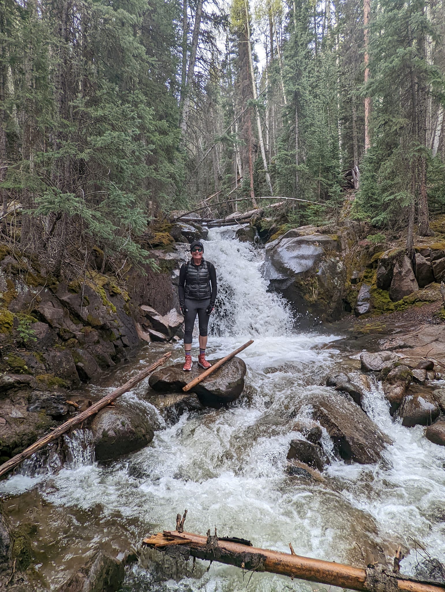 Laurel pauses to enjoy one of the many waterfalls found on the Cataract Gulch trail.