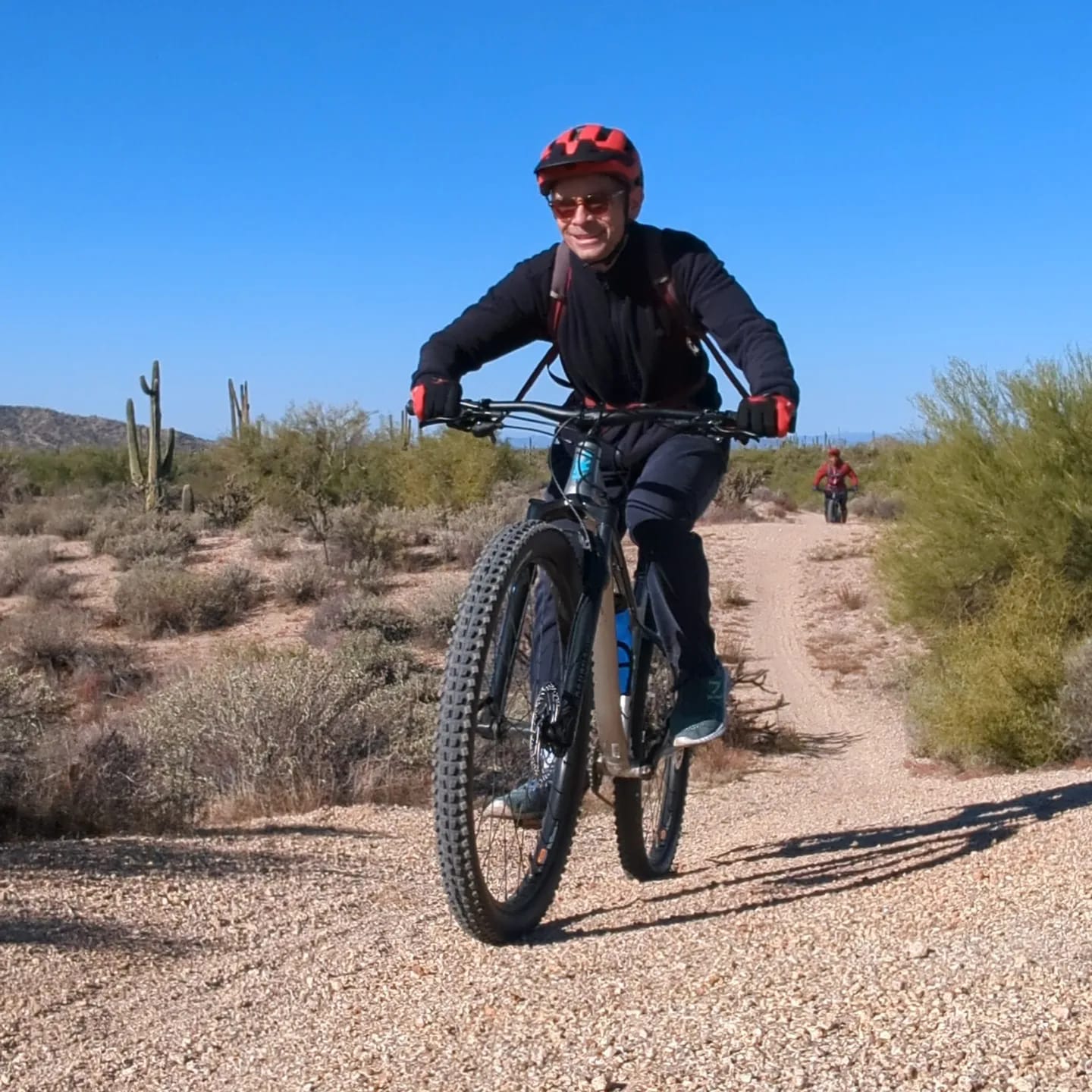 Ted and Marcel tear up the trail during their Phoenix mountain bike tour with the Wild Bunch.