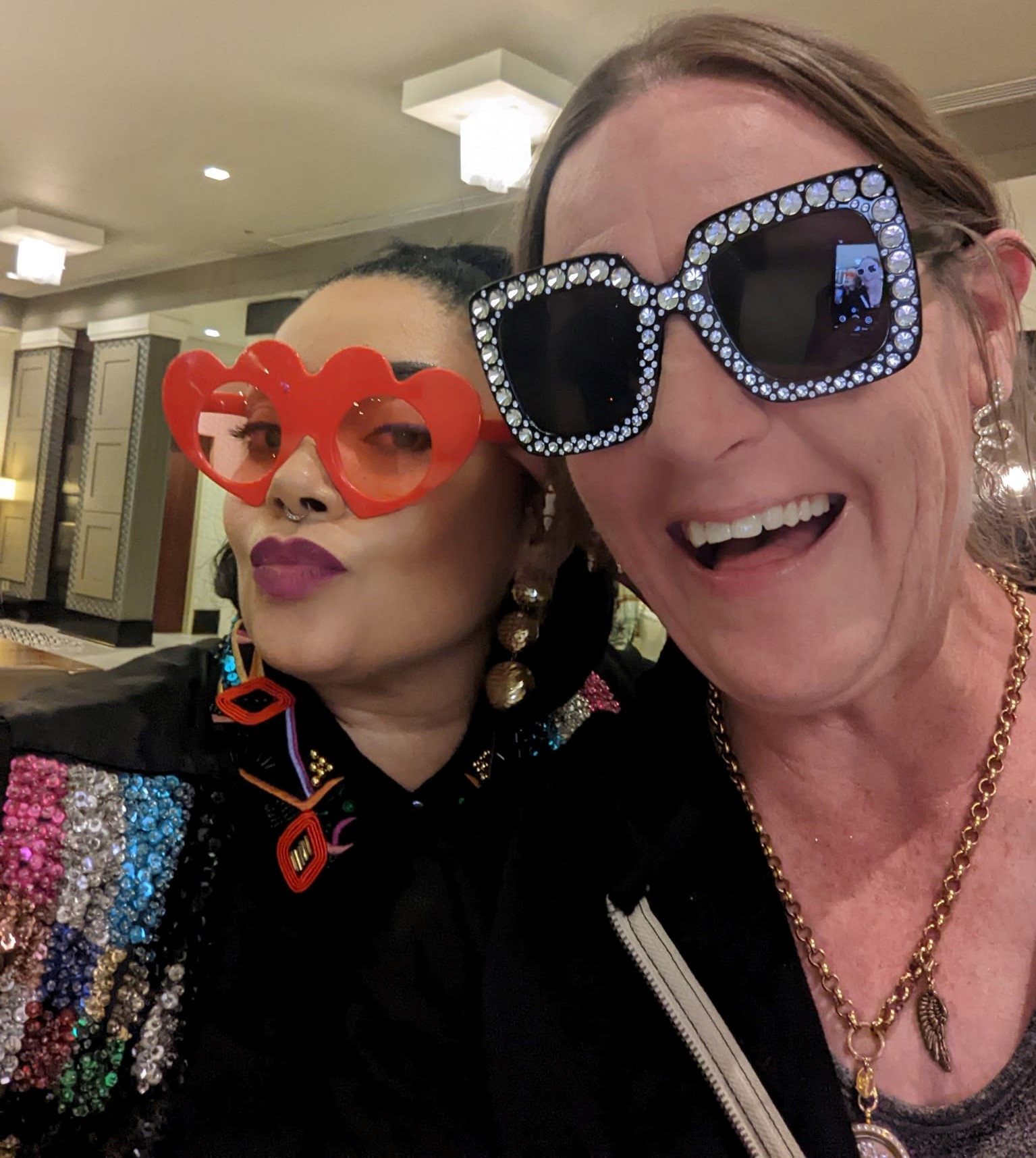 Laurel (left) hams it up before the Elton John concert in her 