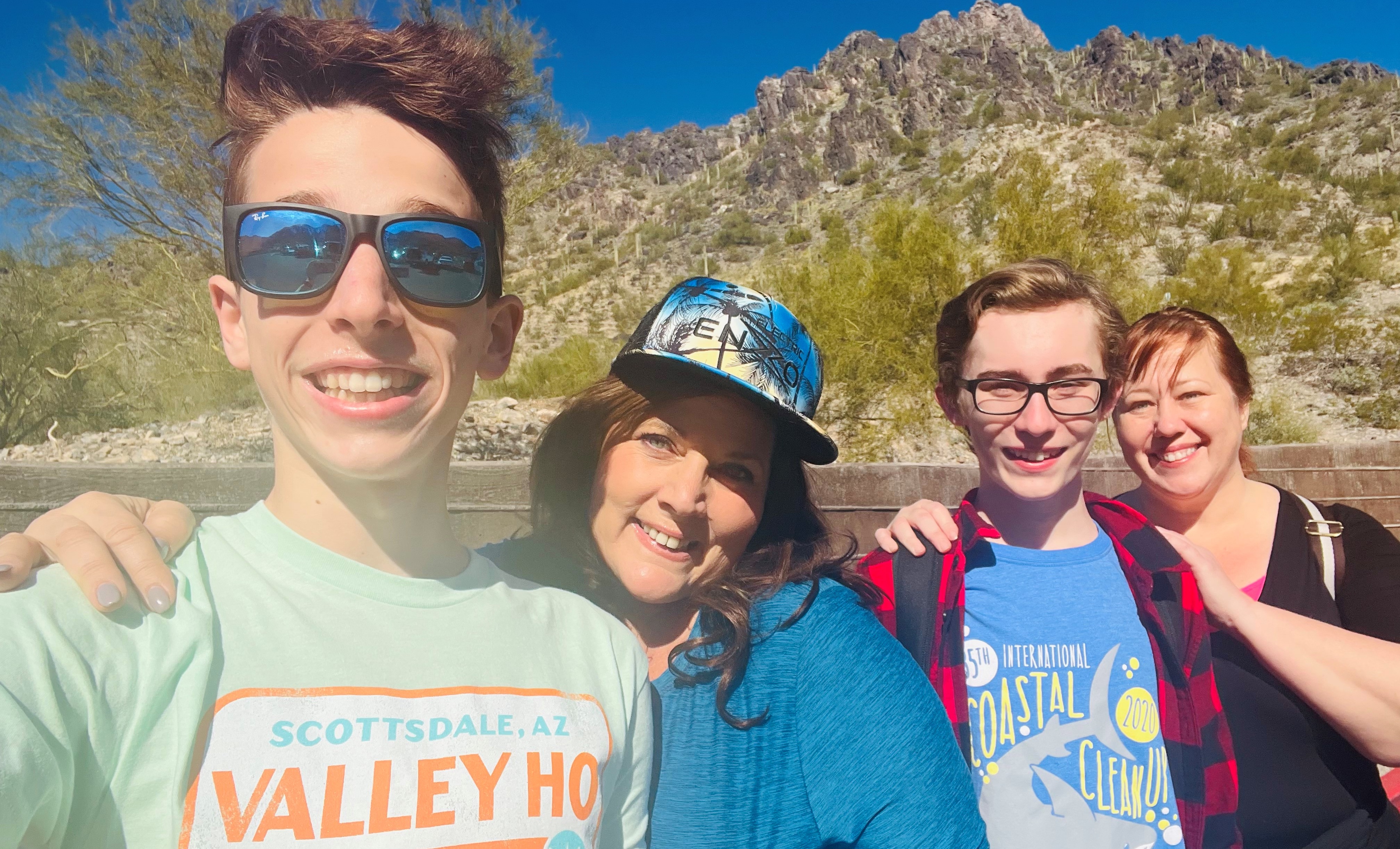 Picking up the Sonoran Desert during one of the 5-star rated Phoenix hiking tours from the Wild Bunch are (left to right): Enzo DeFerrari Wilson, 15; his mother Christine DeFerrari; Ryan Moraleutz, 14 and his mom Angela Moraleutz.