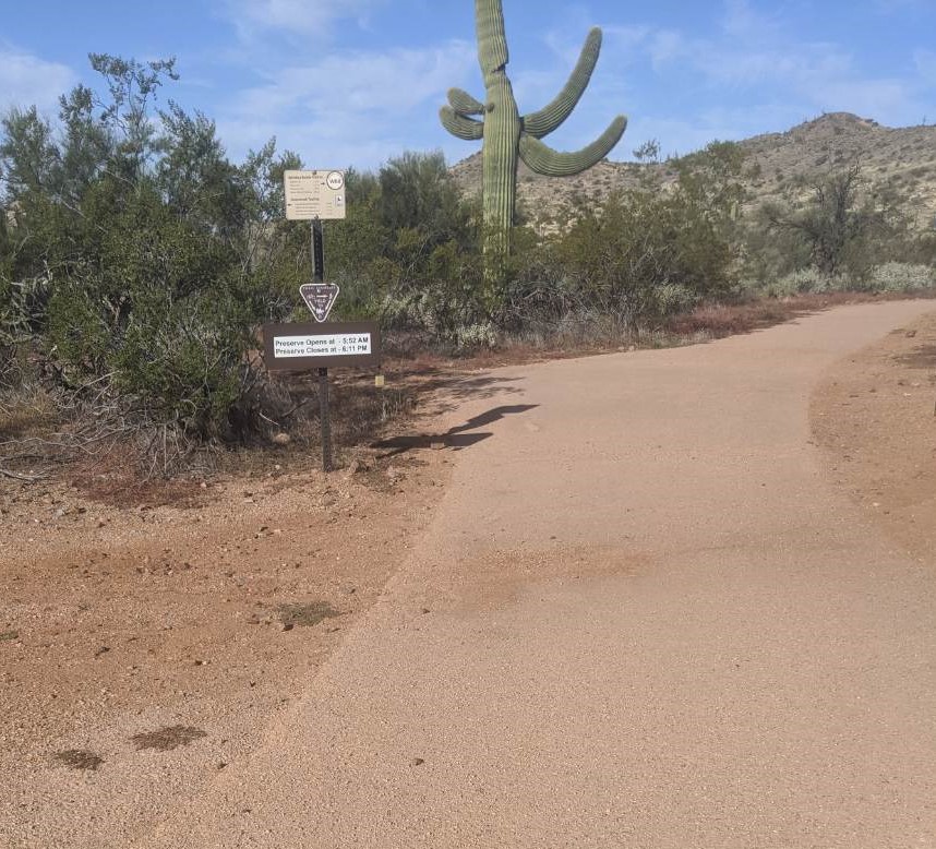 With trees, vegetation and a Saguaro Cactus providing a backdrop, a look at a portion of the picturesque path cut through the Sonoran Desert by the new Camino Campana Nature Trail at the Fraesfield Trailhead.