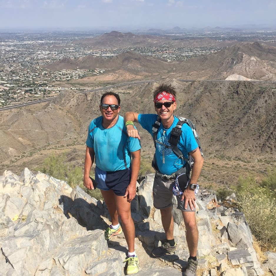 A guide and a guest share a breathtaking view during one of our Phoenix hiking tours. The Wild Bunch Desert Guides want to enjoy showing our guests a good time. However, the guides also are medically trained to handle any emergency while on an adventure.