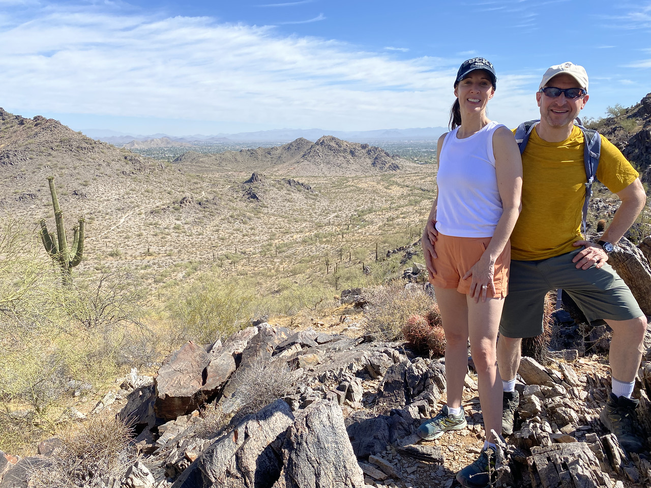 A couple enjoy the beautiful desert scenery during one of this summer's Phoenix hiking tours from the Wild Bunch Desert Guides. 