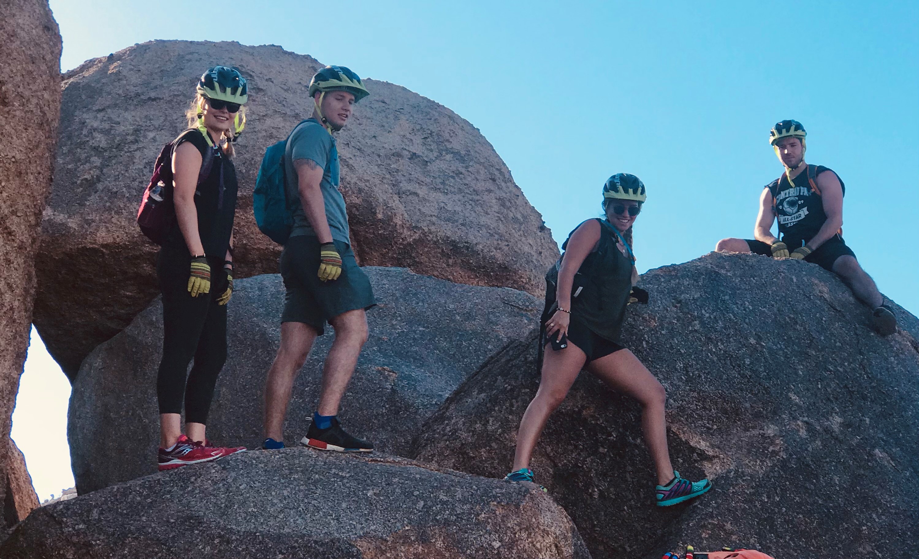 Exploring a scenic rock formation during the 2018 Heinly family trip are, left to right: family friend Emma Thornton, and Heinly children Quinten, Carmen and Gavin.