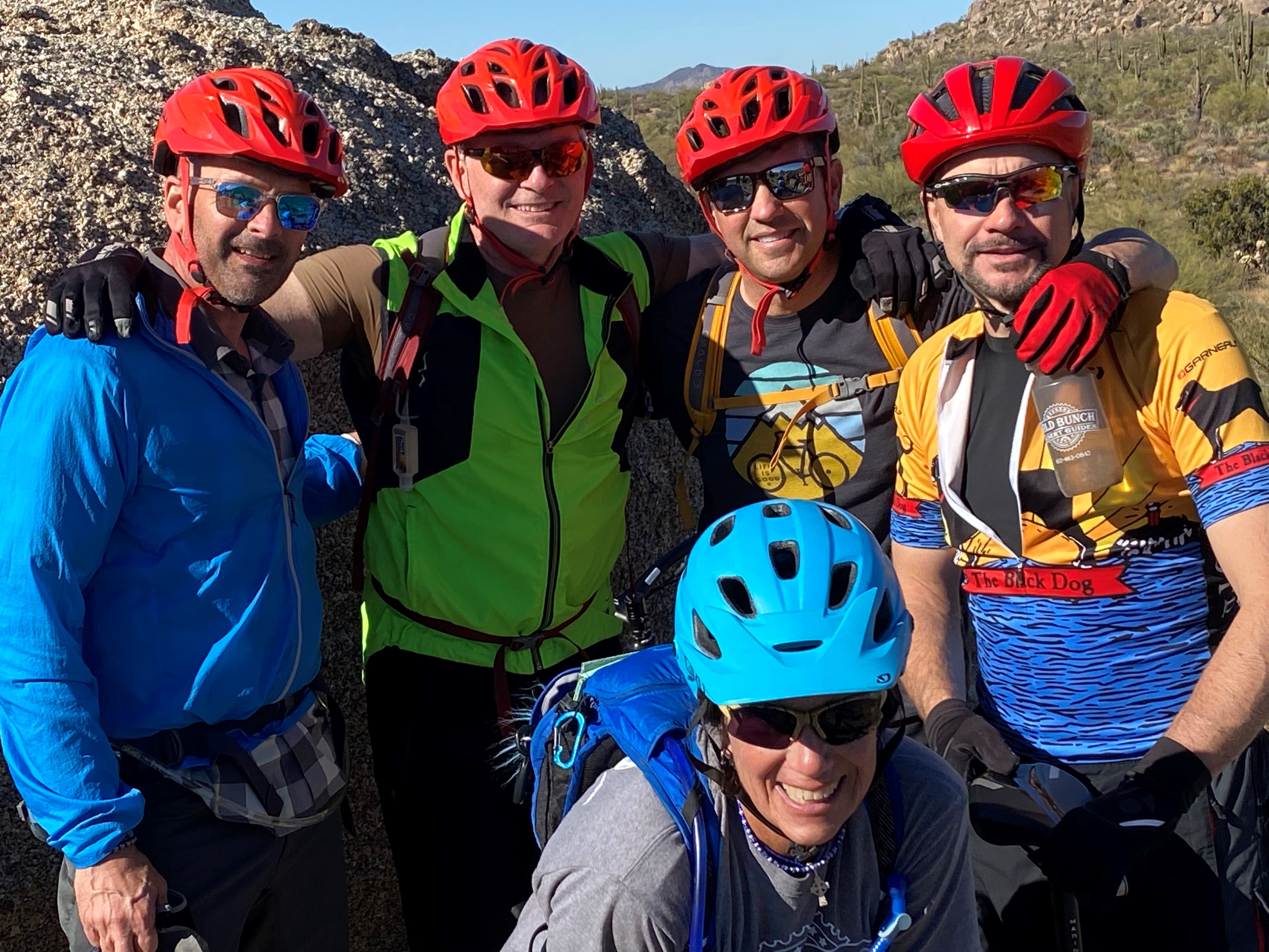 During the Heinly's 2020 visit before the COVID shutdowns, Wild Bunch guide Rebel (front) posed for a picture with these Phoenix mountain bike tour rider -- left to right: Scott Davis, Joe Garapola, Mike Kuczala and Chris Heinly.