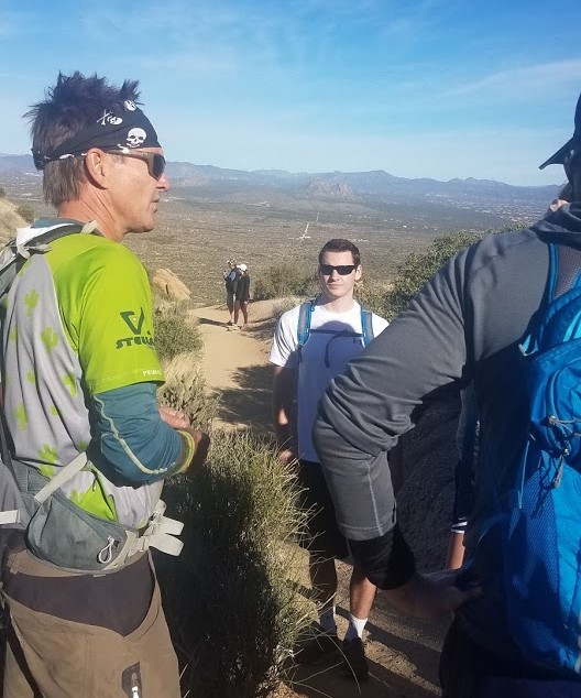 With the natural beauty of the Sonoran Desert as the backdrop, Matt Kalina of Wild Bunch Desert Guides (left) -- a certified professional wilderness guide and holder of multiple other certifications -- shares his knowledge and experiences with a group of guests during one of our Phoenix hiking tours.