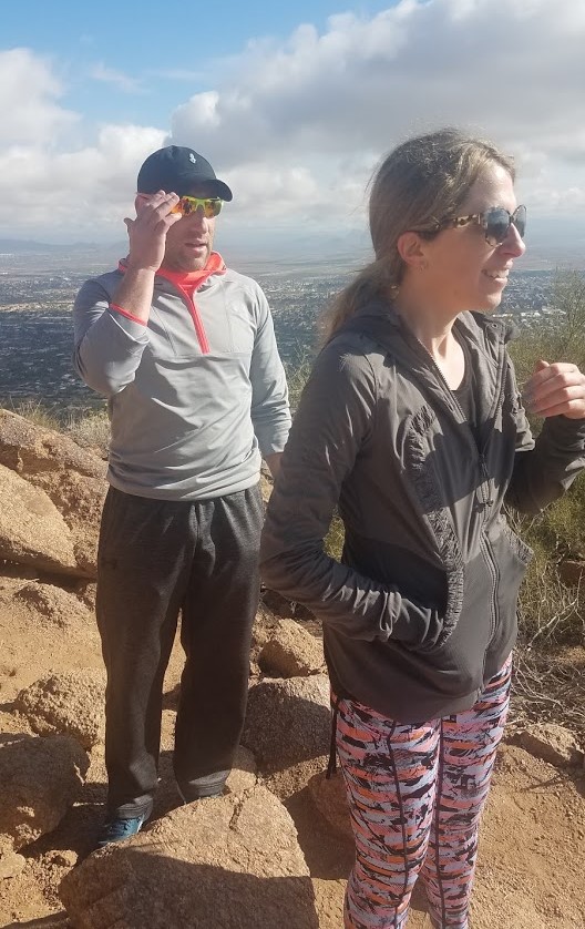 An interested man (left) and smiling woman (right) enjoy the unbelievably beautiful scenery of Arizona's Sonoran Desert during a recent Wild Bunch Desert Guides hike. 