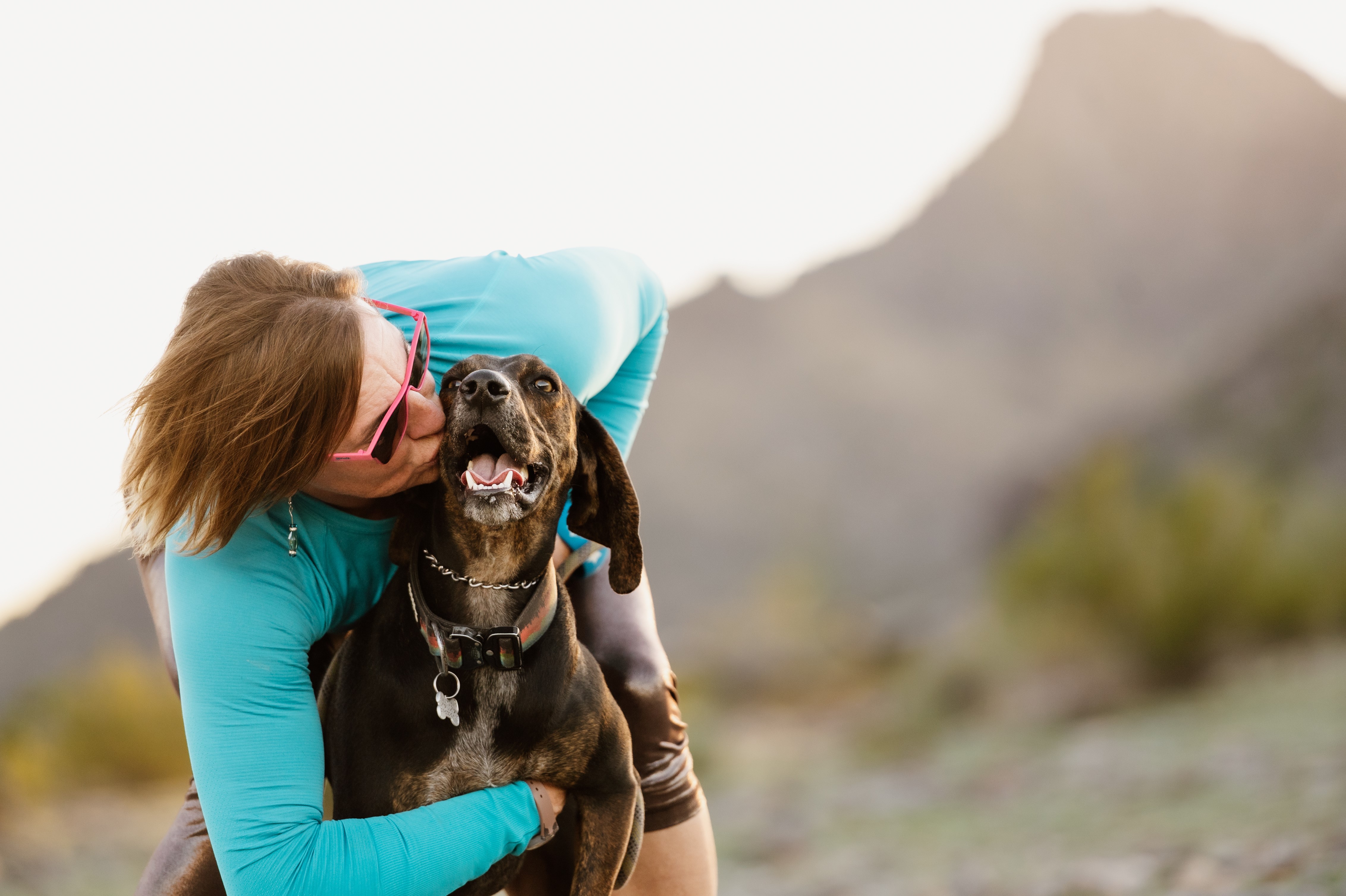 Laurel and Daisy Mae share a tender moment in the Sonoran Desert.