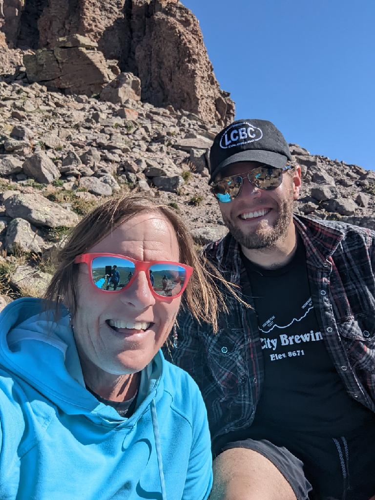 Laurel (left) and Lake City Brewing Company owner Justin enjoy a hike together.