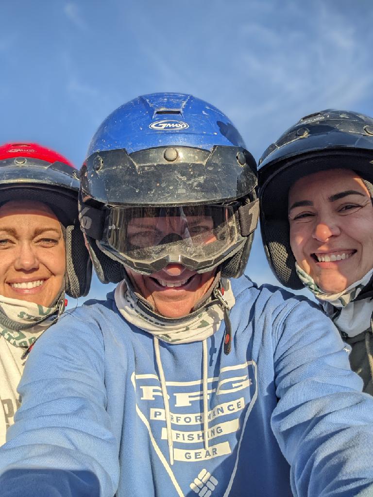 Laurel Darren (center) enjoys a laugh with high school softball teammate Kelly Finch (left) and Kelly's girlfriend, Kate Serrano.