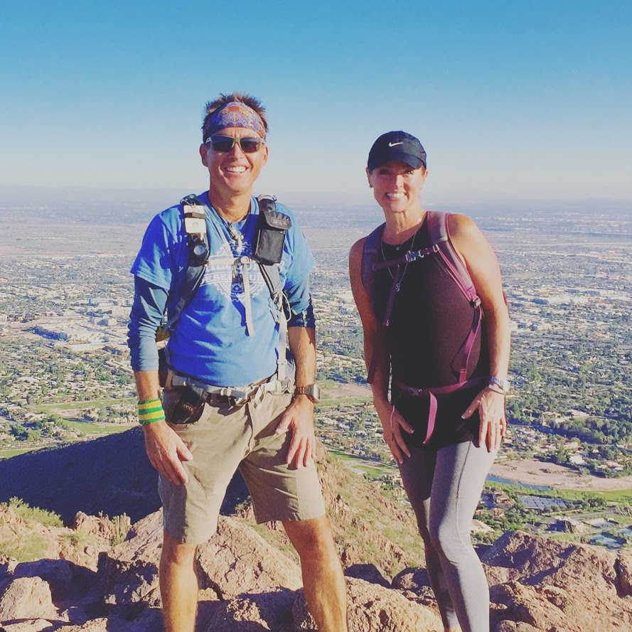 Matt Kalina poses with a guest on the summit of Camelback Mountain, which offers breathtaking panoramic views of the Phoenix area.