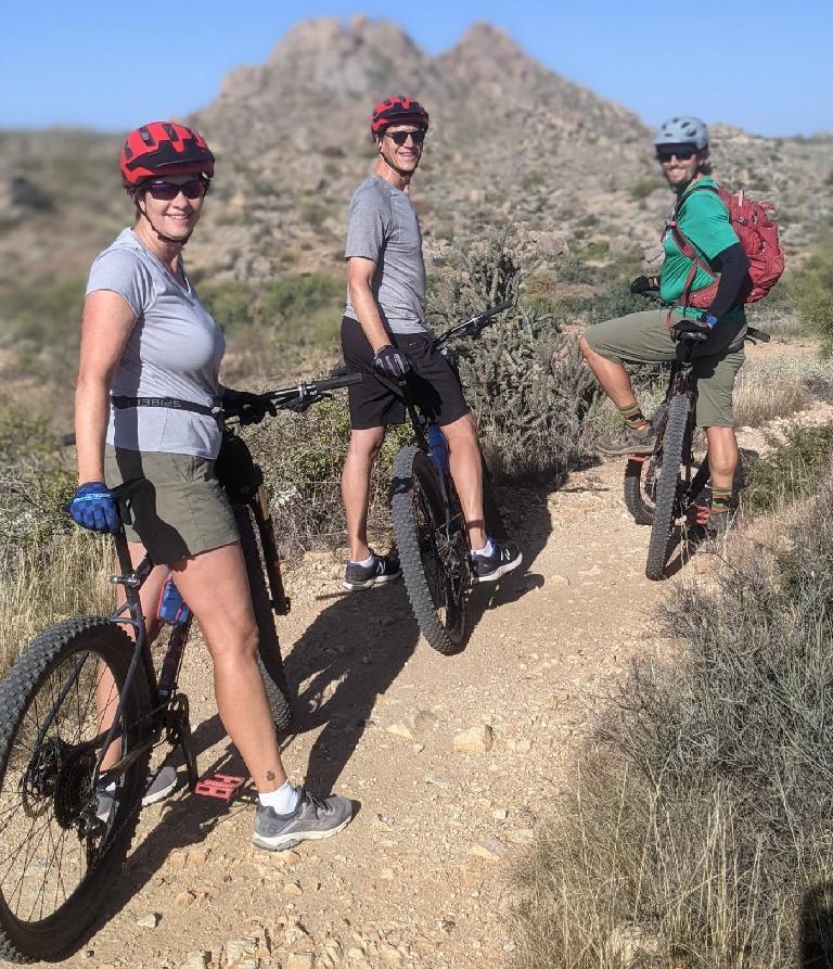 Mike leads a couple of guests from Canada on a Scottsdale mountain bike tour from the Wild Bunch Desert Guides.