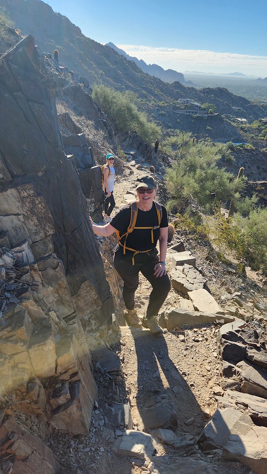 Phoenix hiking tours guests navigate a rocky ridge during their memorable adventure with the Wild Bunch Desert Guides.