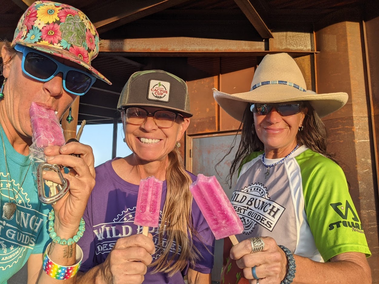 Among the many freedoms we enjoy because of our Memorial Day heroes? Three Wild Bunch Desert Guides, including owner Laurel Darren (left), enjoy Prickly Pear popsicles after a Scottsdale mountain bike tour.