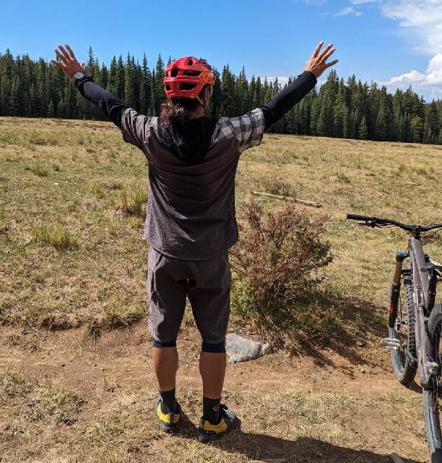 Reed Betz from Irwin Guides convenes with nature during a mountain bike ride with Wild Bunch owner Laurel Darren.