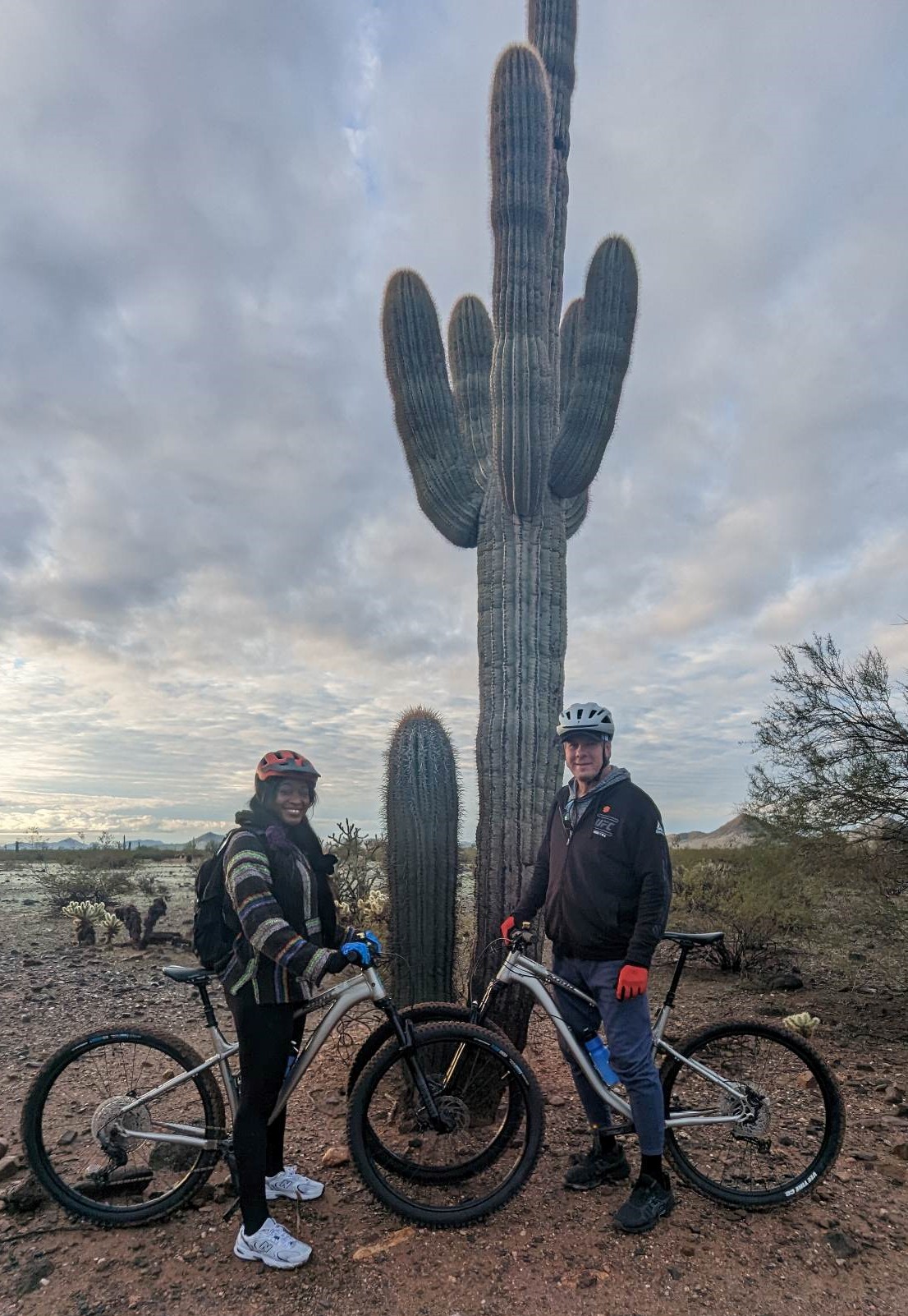 Brent and Gabby pause for a picture beneath one of the Southwester's trademarks, a Saguaro Cactus, during their Phoenix mountain bike tour. 