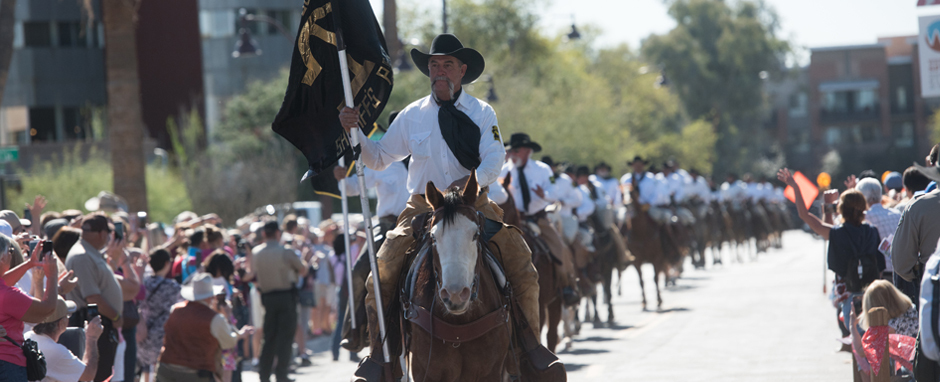 Cowboys on horseback are part of the parade at Old Town Scottsdale's Western Week celebration. (Courtesy scottsdalewesternweek.com)