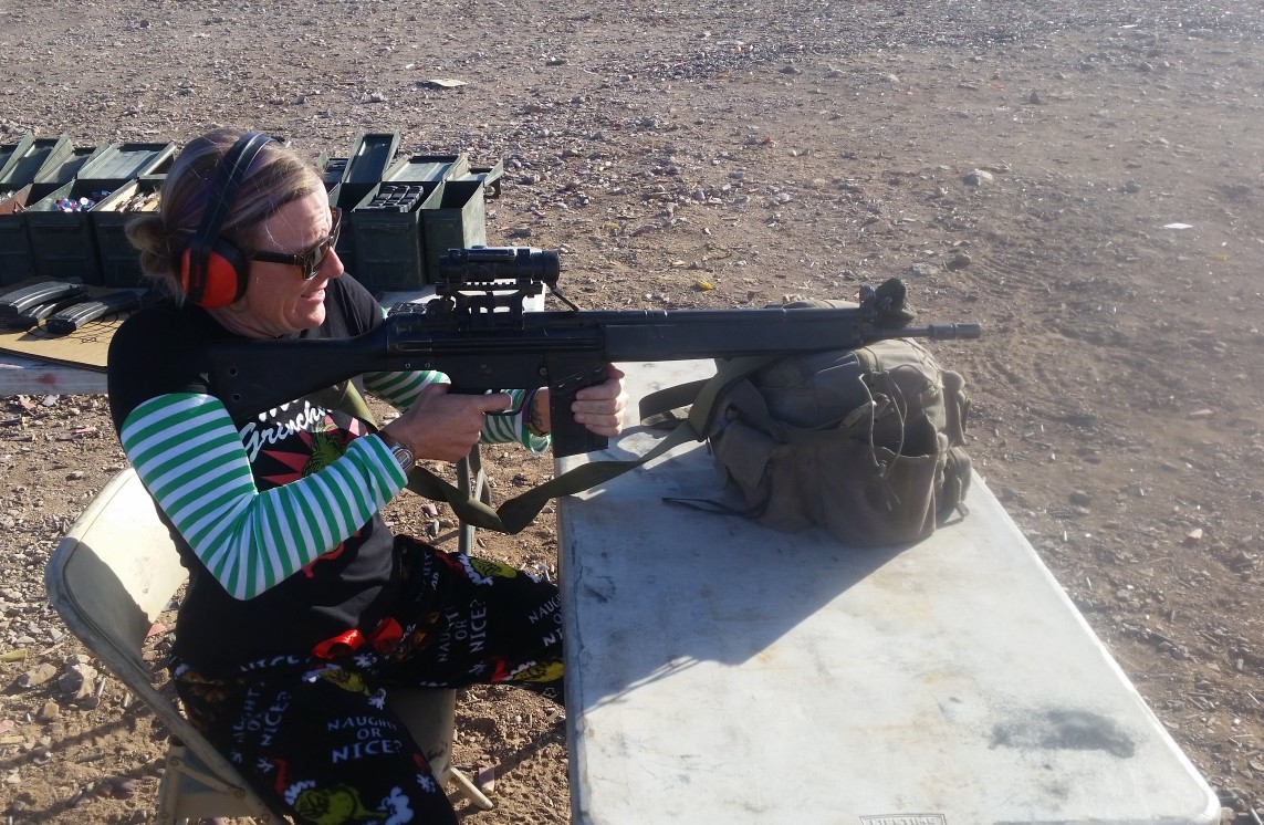 Wild Bunch owner Laurel Darren takes advantage of the shooting adventure with Stellar.