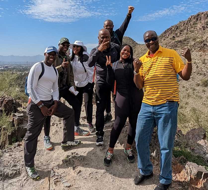 An extended family celebrates on the Sonoran Desert trails one of the Phoenix hiking tours with the Wild Bunch,