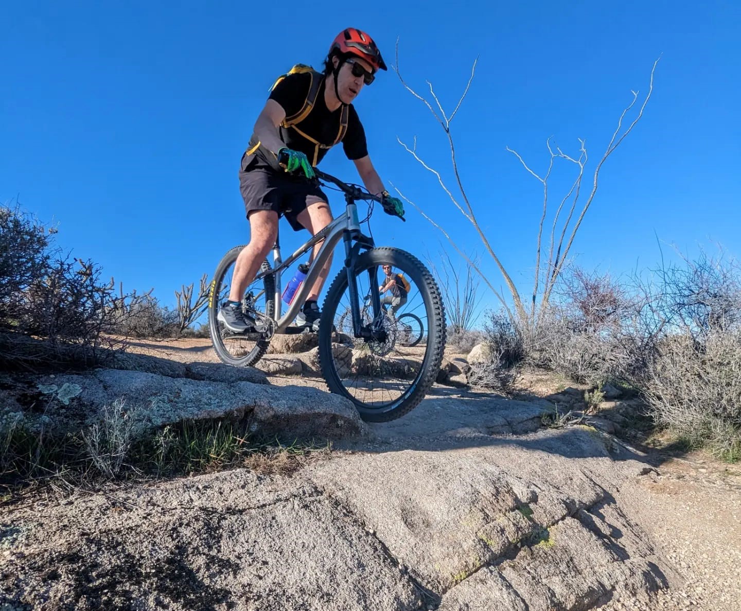 A guest enjoys a challenging desert trail during one of the Phoenix mountain bike tours from the Wild Bunch.