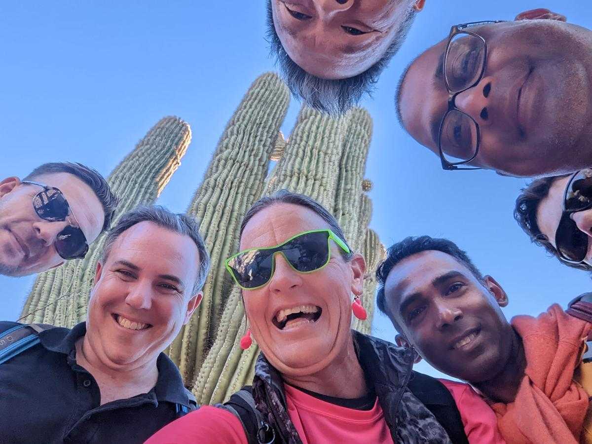 Wild Bunch Desert Guides owner Laurel Darren (center) surrounded by Phoenix hiking tours guests.