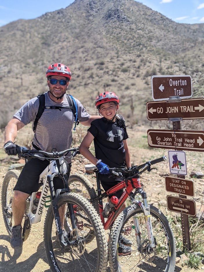 Bless our Memorial Day heroes for making possible guided Scottsdale mountain biking, where a smiling father and son duo (pictured) can enjoy some quality time together in breathtaking surroundings.