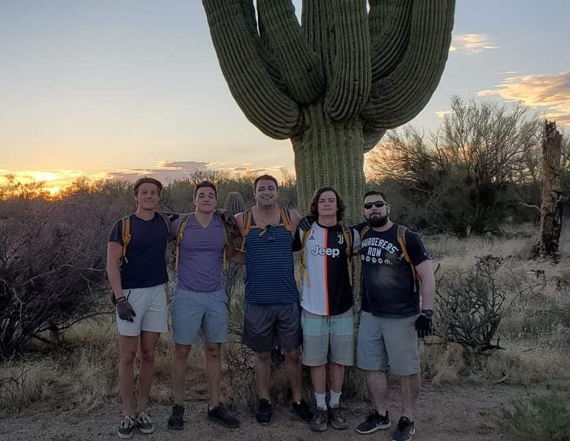 The heroes we celebrate on Memorial Day made it possible for Americans to enjoy activities such as Phoenix hiking and beautiful sites including an Arizona sunset. (Pictured) A group of five friends enjoy both items during one of the Phoenix adventure tours with the Wild Bunch Desert Guides.